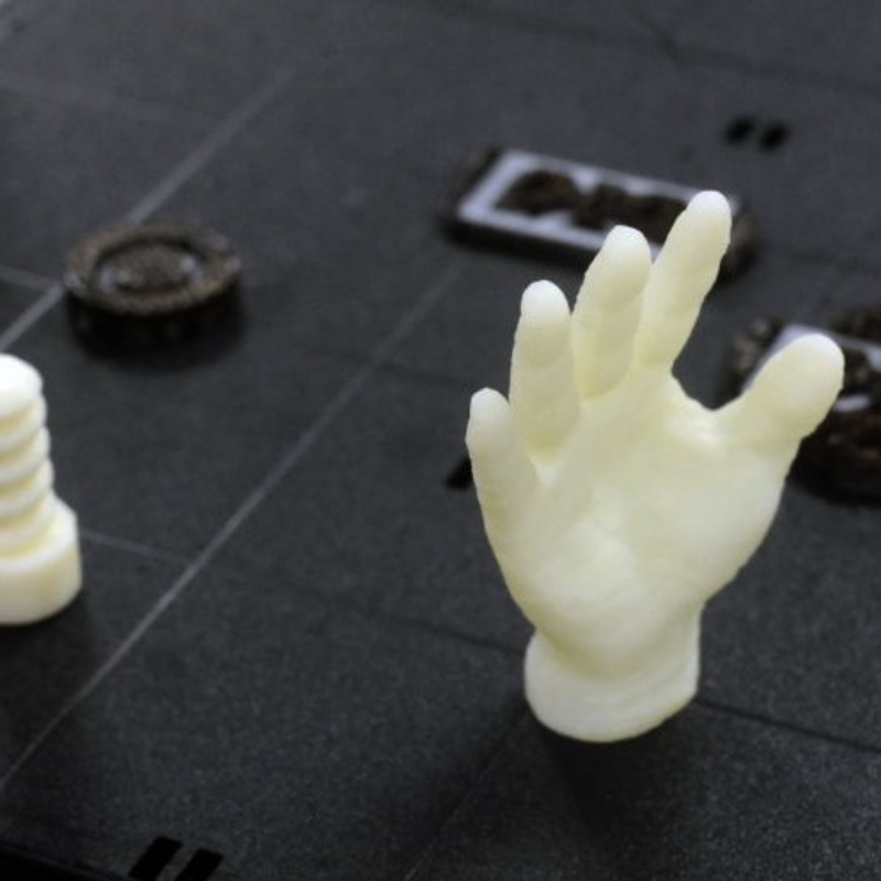 A photo of sample parts printed with the Stratasys F270 3D printer